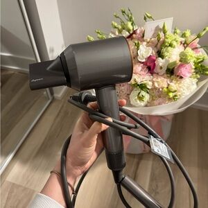 Dyson Hair Dryer in Gunmetal Gray with Dark Gray Cord